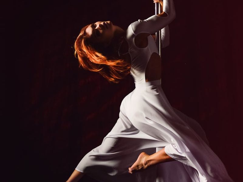 Man in a dynamic, controlled lunge position, showing strength and balance.